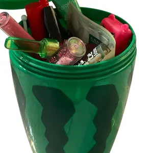 Kiss de Labials and More in Green Container with Assorted Items Inside Gloss Lipstick Cosmetic Lip Care
