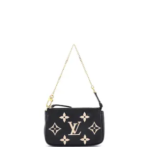 Pre-owned Louis Vuitton Leather Clutches & Wristlets Pochette Accessoires Bicolor Monogram Empreinte Giant Mini by Rebag
