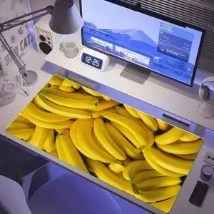 Neat Organized Desk Setup with Banana Desk Mat, White Monitor, Alarm Clock, Desk Lamp, Headphones - Perfect for Home Office Workspace, Study Area, or Gaming Station (with Realistic Banana
