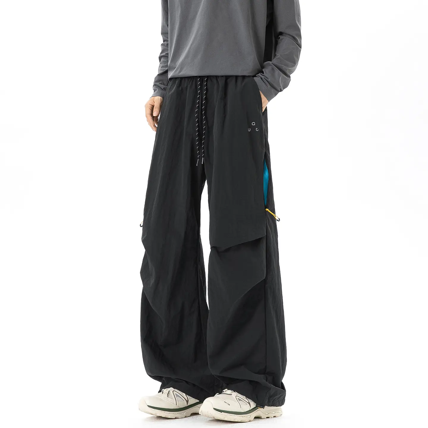 Spring/Autumn men’s functional cargo pants with multiple pockets, drawstring waist, wide legs, waterproof quick-dry design, patchwork details, ruched drape, floor-length casual paratrooper trousers
