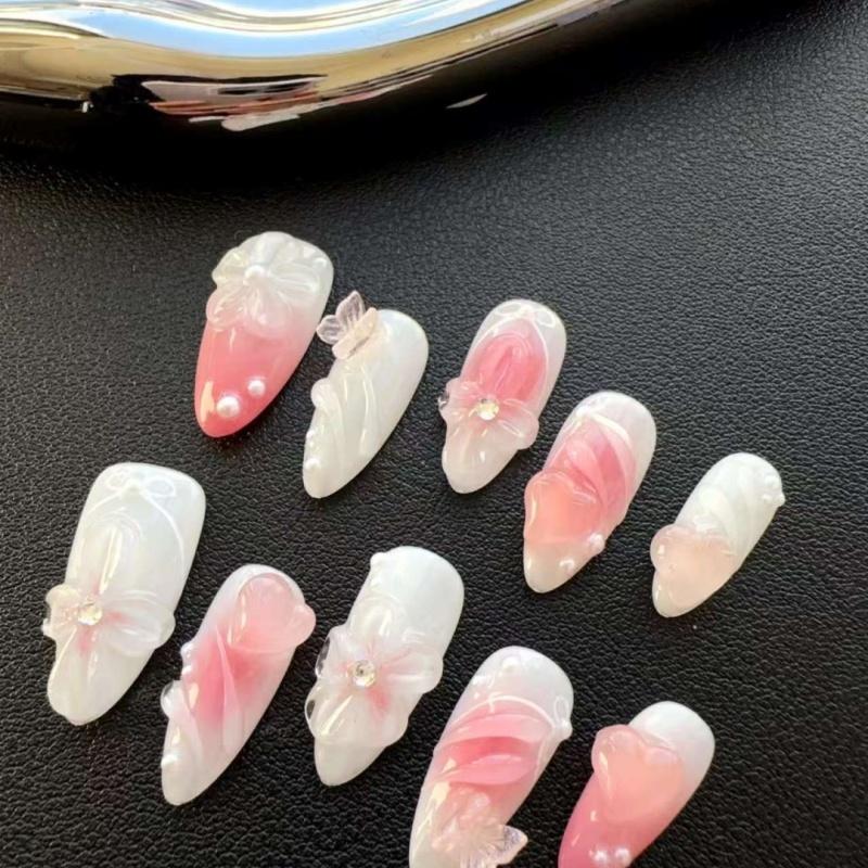 Mid almond 23mm style nail art, pink and white gradient -3D decoration of flowers, butterflies, pearls, and rhinestones, with a fairy like and gentle sweet element, so dreamy and girlish!