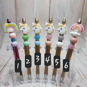 Unicorn beaded pen with refillable ink. Rainbow beaded pen with refillable ink.