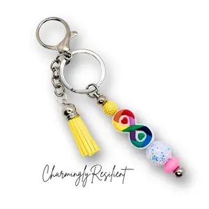 CharminglyResilient Colorful Autism Awareness Beaded Bag Charm with Yellow Tassel