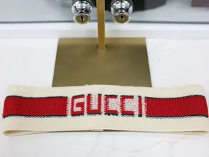 GUCCI LOGO STRIPE HEADBAND IN CREAM WITH RED AND GREEN STRIPES