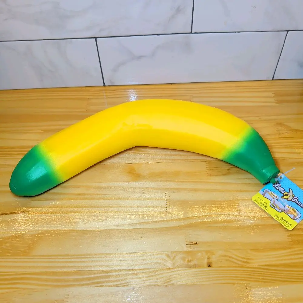 SUNNY DAYS!( LAFFY SNACKS )  SQUEEEZY BANANA!!  JUMBO SQUISHY FOR AGES 3+.GREAT FOR STRESS RELIEF!!