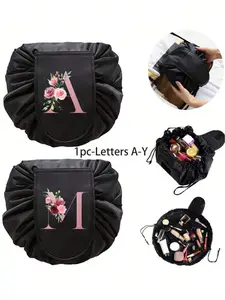 Flower and pink letter A-Z portable black drawstring makeup bag, travel storage bag, bathroom storage bag, jewelry storage bag, for giving to mothers, birthdays, friends, and teachers. ideal choice for back to school season, travel essentials