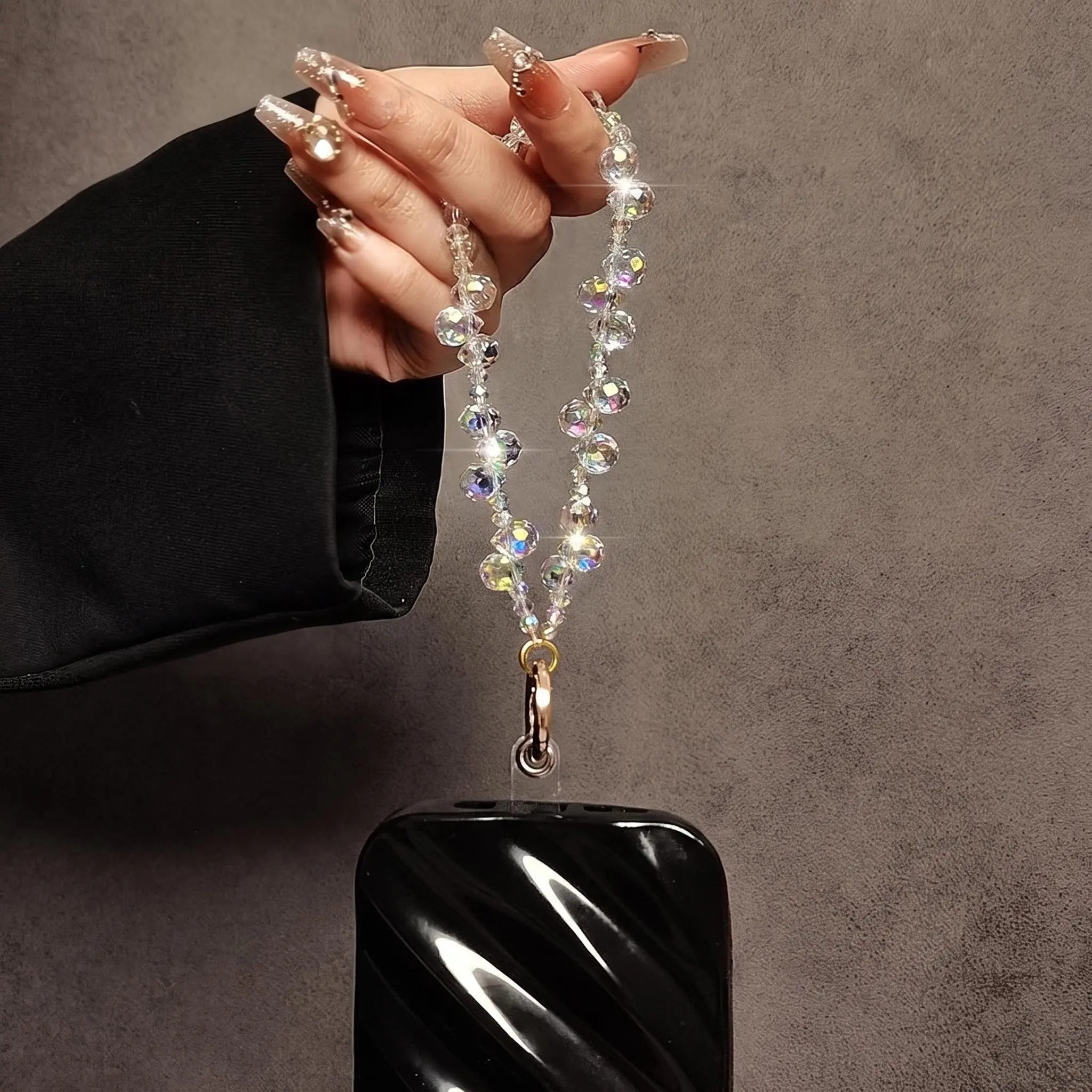 2026 Trendy Clear Iridescent Crystal Beaded Phone Wrist Strap Faceted Clear Beads Gold Hook Lanyard Sparkling Y2K Fairycore Aesthetic Portable Daily Carry Hand Strap Sweet Birthday Gift for Her Girl Dress up your phone with this unique shining accessories