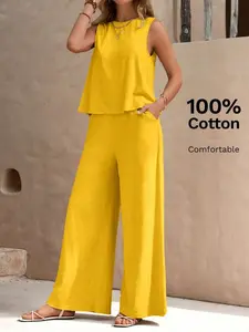 A two-piece casual womenswear set with a yellow sleeveless top and wide-leg pants. The sleeveless vest and high-waist wide-leg pants offer a relaxed and comfortable style. Suitable for everyday commuting, weekend shopping, and more.