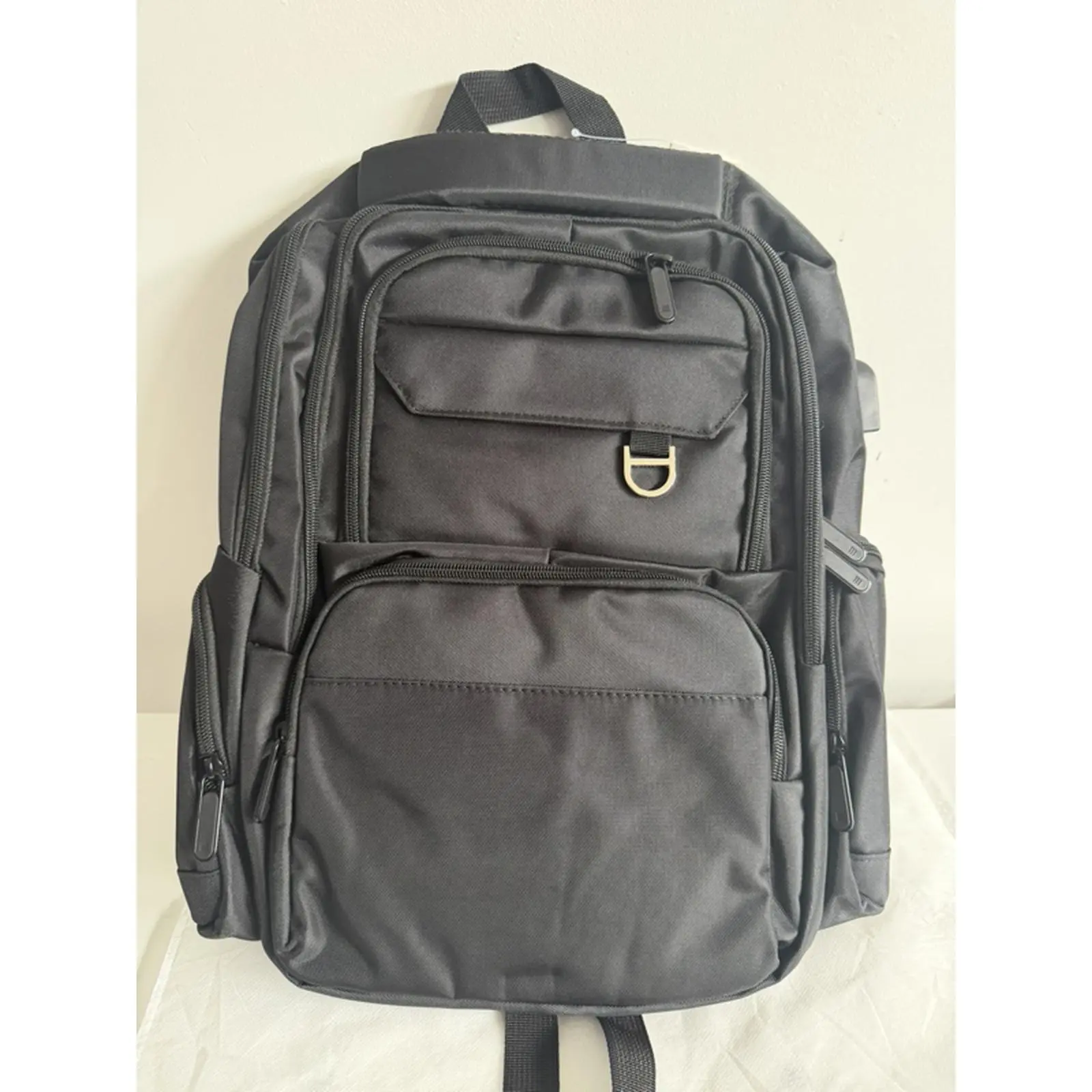 Black Backpack with Multiple Pockets and Adjustable Straps for Everyday Use