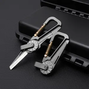 Titanium alloy multifunctional keychain, portable and can be used to fasten backpacks, comes with a small knife.