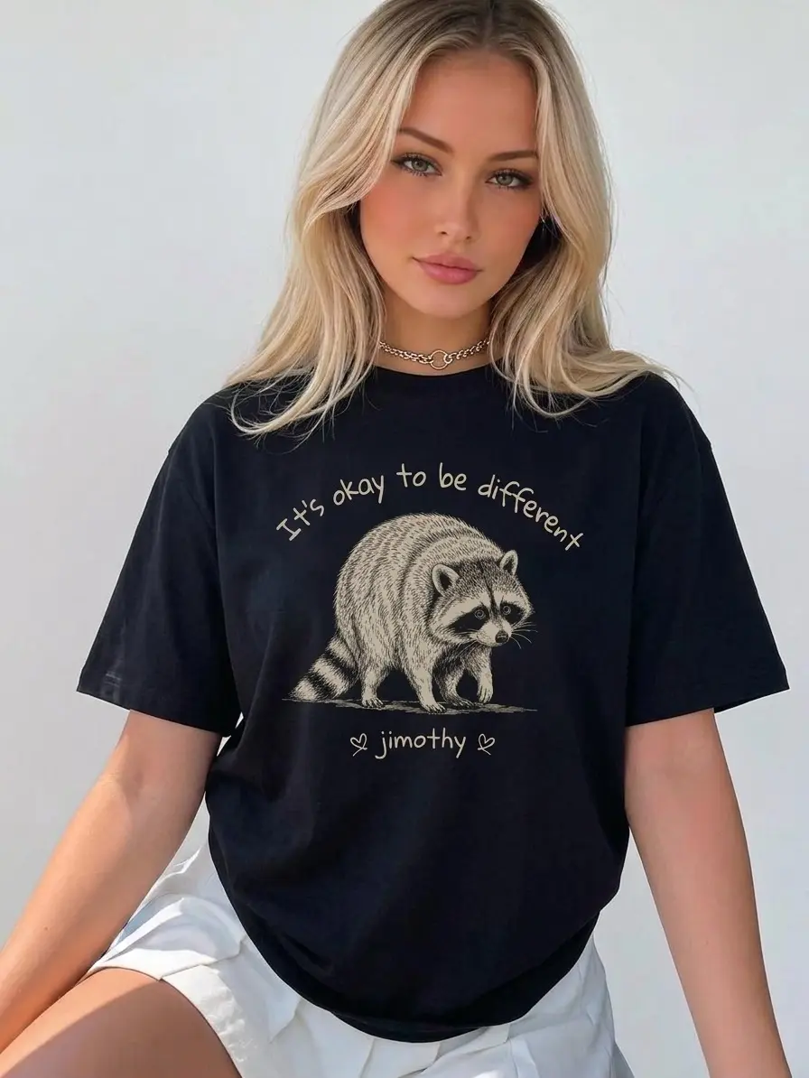 Jimothy Raccoon It’s Okay to Be Different Shirt, Cute Raccoon Positive Quote Graphic Tee