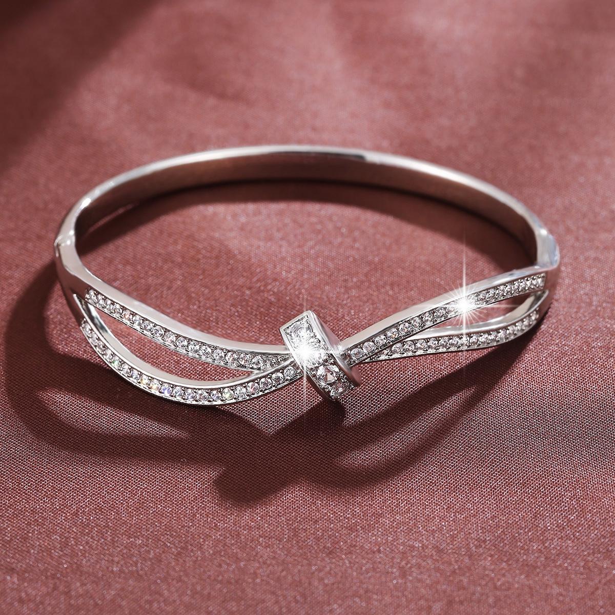 Luxury Intertwined Ribbon Knot Bangle Bracelet for Women, Elegant Polished Sparkle Hinged Cuff Bangle, Premium Statement Bracelet, Trendy 2026 Aesthetic Bridal Formal Jewelry, Timeless Anniversary Birthday Gift for Her