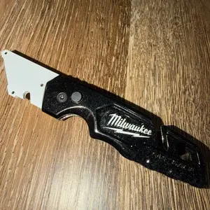 Metallic black Milwaukee fastback