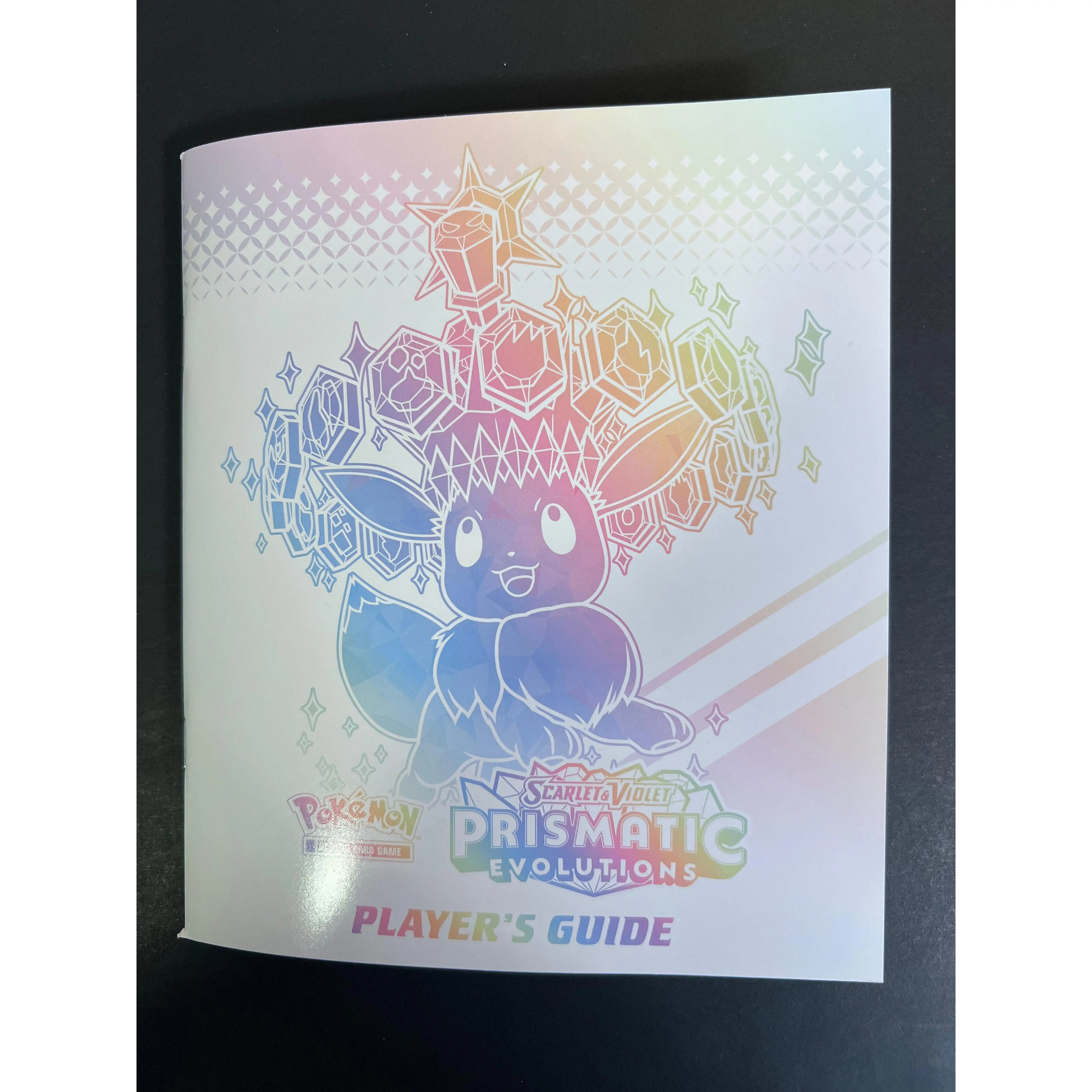 Pokemon Prismatic Evolutions Player's Guide Book - Eevee - TikTok Shop Pokemon Prismatic Evolutions Player's Guide Book - Eevee - TikTok Shop