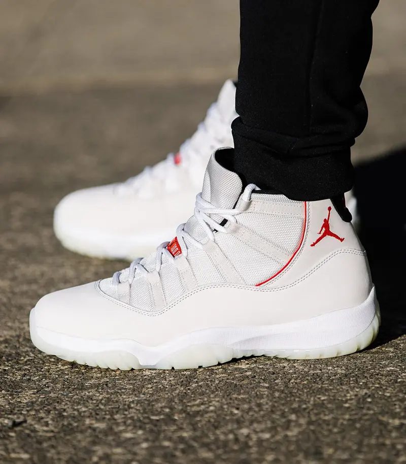 Creamy off-white thin red stitched mesh high-top retro basketball sneakers featuring scuff-proof dual-tone milky white off-white layered translucent rubber outsoles, tear-resistant sweat-wicking soft perforated mesh leather construction