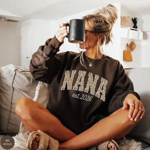 Custom Leopard Nana Sweatshirt Personalized Kid's Name on Sleeve Christmas Gift for Nana Est. 2026 Sweatshirt