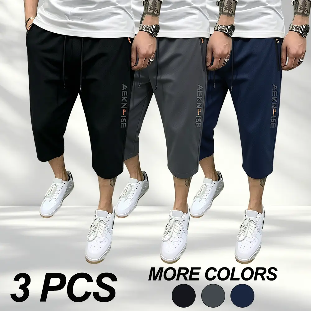 New Summer Men’s Letter-Print 3/4 Shorts — Versatile shorts with zippered pockets for secure carry, an elastic waistband for a flexible fit, and breathable fabric that stays cool on the go. Ideal for outdoor sports and cycling.
