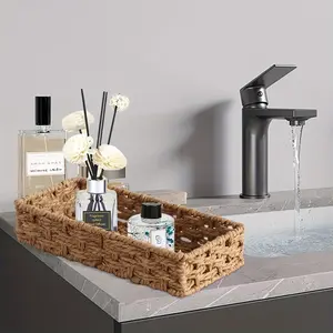 Brown rectangular pastoral-style large-capacity storage , a hand-woven rattan storage  for small items. It serves as a decorative storage  for the living room coffee table, featuring a large capacity and pastoral style. boyfriend