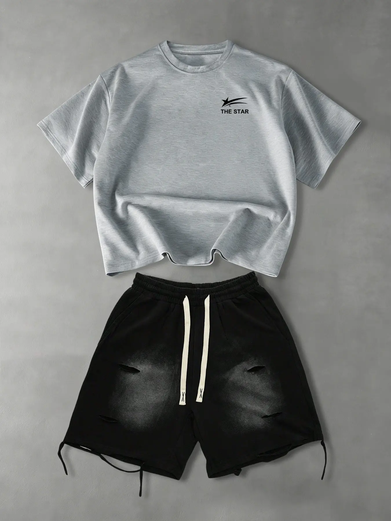 Men's short-sleeved Casual T-shirt Shorts Set Outfit: a printed crew neck T-shirt and a pair of distressed washed ripped shorts. The T-shirt features star and letter prints and is suitable for all seasons. Menswear Casual Clothing Set