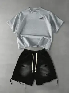 Men's short-sleeved T-shirt set: a printed crew neck T-shirt and a pair of distressed washed ripped shorts. The T-shirt features star and letter prints and is suitable for all seasons.