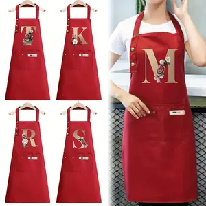 Red Polyester Apron, Gold Floral Letter "M" - Adjustable Straps, Large Pockets, Suitable for Cooking, Gardening, Painting, Baking - Perfect for Holidays, Christmas, Halloween, Holiday Apron| Floral Embroidery| Adjustable Strap Apron