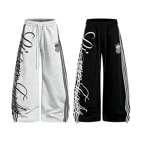Men’s side stripe wide-leg sweatpants with drawstring waist and script graphic print, loose casual hip hop streetwear jogger pants