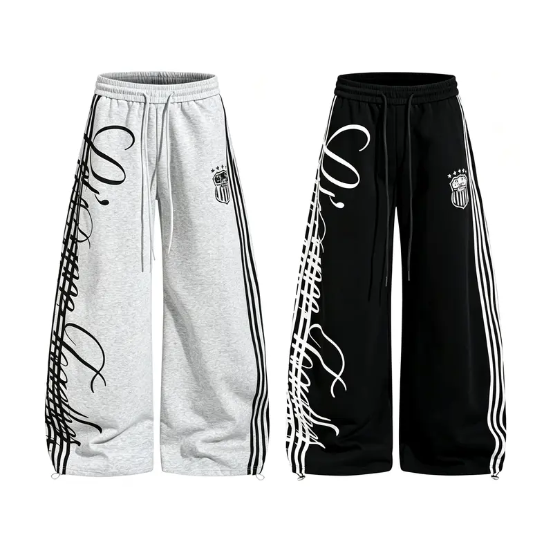 Men’s side stripe wide-leg sweatpants with drawstring waist and script graphic print, loose casual hip hop streetwear jogger pants
