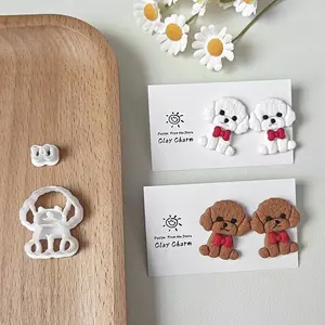 Two sets of jewelry making kits featuring a Teddy dog pattern with a bow, a polymer clay cutter with a pet image in the shape of a gentleman's dress, a jewelry clay cutter, a soft clay cutting tool suitable for soft clay earrings and jewelry, a clay mold