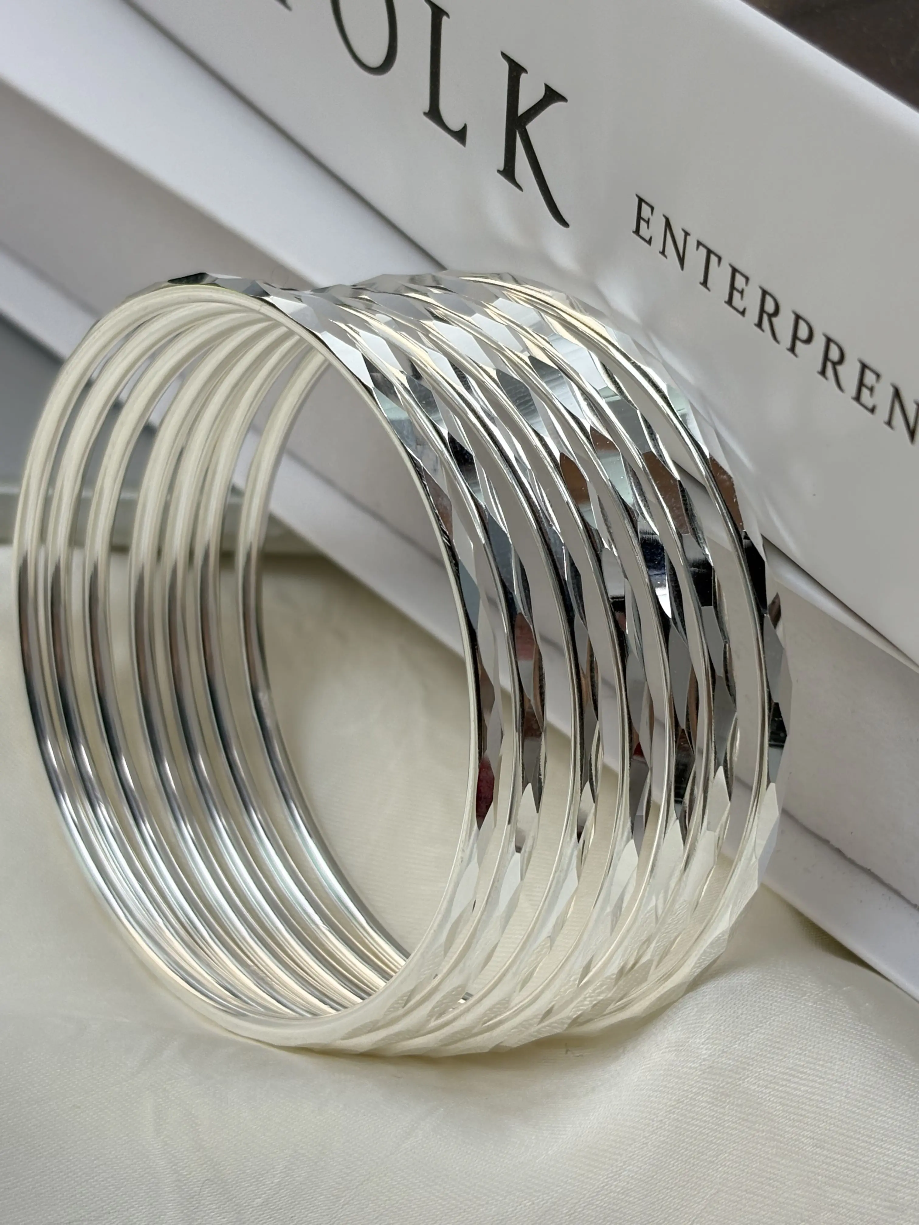 Women's 925 Sterling Silver Stackable Bracelet Set—featuring sparkling diamond-cut detailing and a minimalist textured wire design; a slender, high-polish fashion accessory perfect as a birthday gift.