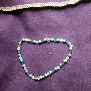 Handmade Faceted Glass Beaded Bracelet with Heart-Shaped Design, Featuring Beads in Various Colors and Shades