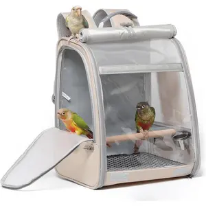 Portable Travel Bird Carrier Backpack Breathable Lightweight Parrot Carrier with Standing Perch 2 Feeder Cups Iron Mesh Removable Easy Clean Tray (Cream)