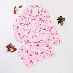 Women's Christmas-themed printed casual pajama set, featuring pocket details, collar, long-sleeve top, and matching pants, suitable for Christmas homewear and outings.