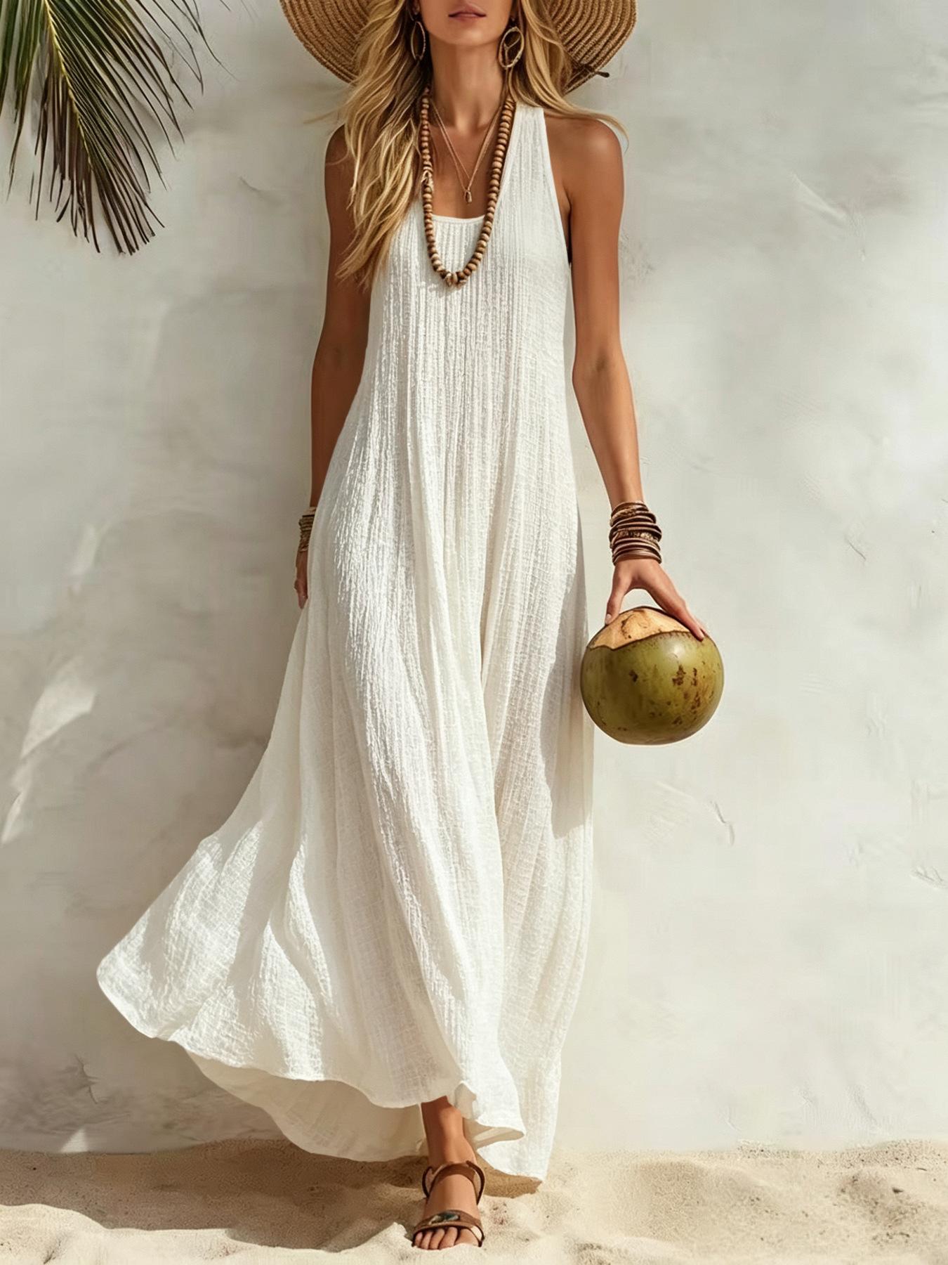Women’s summer dress with a relaxed Bohemian beach vacation vibe—loose fit that flatters the figure and is comfortable, long length. Women’s summer dress with a relaxed Bohemian beach vacation vibe—loose fit that flatters the figure and is comfortable, long length.