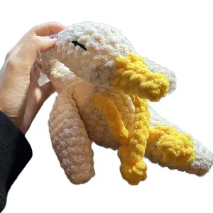 Gina the white and yellow sleepy Goose