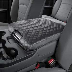 Center console lid compatible with 2013-2018 Dodge Ram 1500 models and 2013-2024 Dodge Ram 2500/3500/1500 Classic models. Armrest box lid and center console lid accessory made of polyurethane (PU) leather, featuring a hidden pocket. Only ap FFVentureVibe8