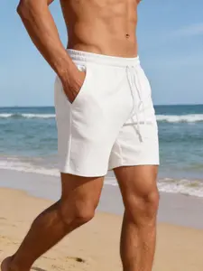 Men's waffle-style beach shorts, featuring elastic drawstring waist and leg drawstrings. Suitable for vacations and casual wear. Can be used as home wear, casual outdoor outfits and summer daily wear.