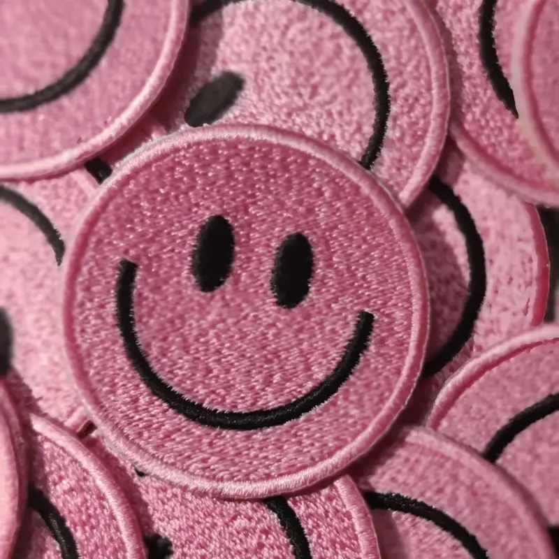 Cheerful Pink Smiley Face Patch - Adorable Embroidered Applique for DIY Projects & Clothing Decor