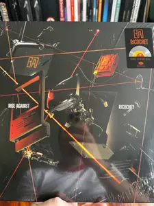 Rise Against - Ricochet - Limited Colored Vinyl with Opaque Orange Center & Clear Outside  [VINYL RECORD - LP] Colored Vinyl, Clear Vinyl, Ltd Ed, Orange, Italy - Import