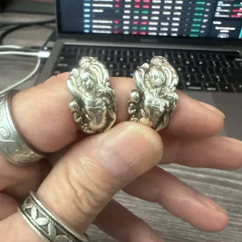 1899 love disarmed spoon ring in sterling silver .