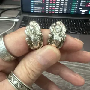 1899 love disarmed spoon ring in sterling silver .