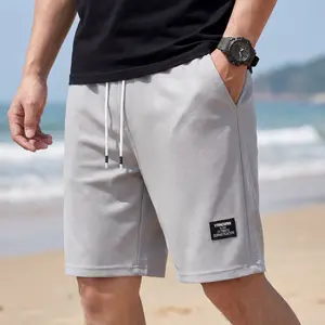 Men’s textured casual shorts with a drawstring waist, made from lightweight polyester fabric, suitable for everyday wear, the beach, or outdoor activities | Drawstring-waist shorts | Lightweight shorts