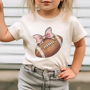 Youth Football Bow T-Shirt, Coquette Football Girl Shirt, Cute Football Shirt, Preppy Football, Youth Girl ClothingTrending tee, youth clothing, Family shirt, gift for son and daughter, holiday outfit, halloween shirt, funny shirt