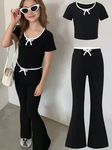 A 2-piece set of black and white contrasting short sleeved top and pants for young girls, casual, comfortable and versatile, suitable for travel, play and sports, beautiful girl set, machine washable and dry cleanable
