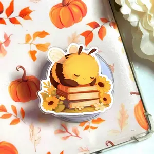 Cozy Bee Sleeping on Books Phone Grip, Aesthetic Spring Floral Magsafe Holder, Trendy Bumblebee Griptok, Cute Gift for Kindle Readers & Nature Lovers