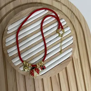 Cordón de Mariquitas Bien Chulo Measure 16 Fully Adjustable Red Cord with Gold Charms and Ladybug Pendant for Stylish Outfits