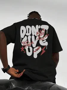 "Don't Give Up" Street Graffiti Inspirational T-shirt - Black, Attitude Vibe  Drip Font + Positive Slogan, Heavyweight Cotton, Loose Drop Shoulders. A must-have for lovers of American street style and trendy fashion. #AmericanStreetStyle
