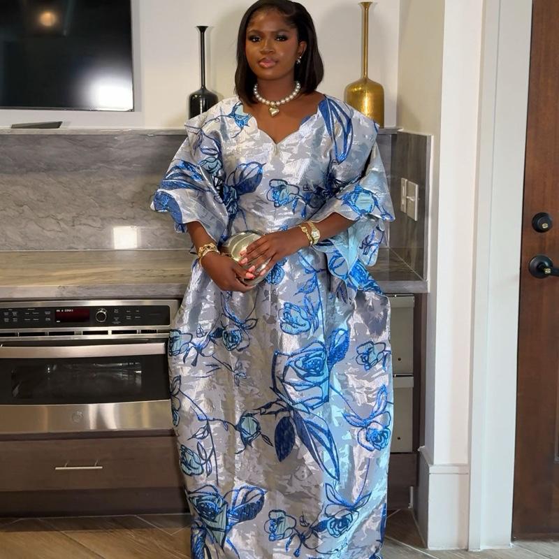 Arwa Brocade Elegant Dress for Women - Blue Floral Design on Gray Fabric with a ruffled sleeve and classic cut for any occasion