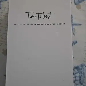 Luxury business quartz watches for ladies and gentlemen, featuring solid stainless steel straps, calendar function, and water resistance. With a minimalist design, they are elegant and durable, suitable for daily wear.