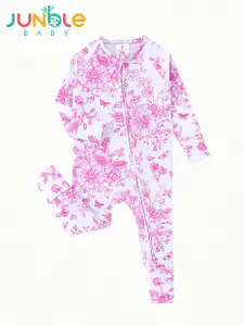 Baby bamboo fiber zipper pull-through dress in pink with floral print and double zippers. Soft fabric. Reversible foot cover. One-piece play suit.