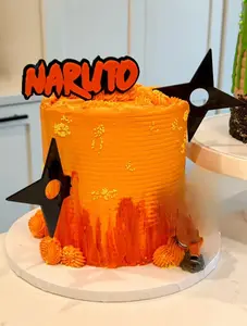 Naruto Ninja orange and black acrylic cake topper with 2 shuriken stars